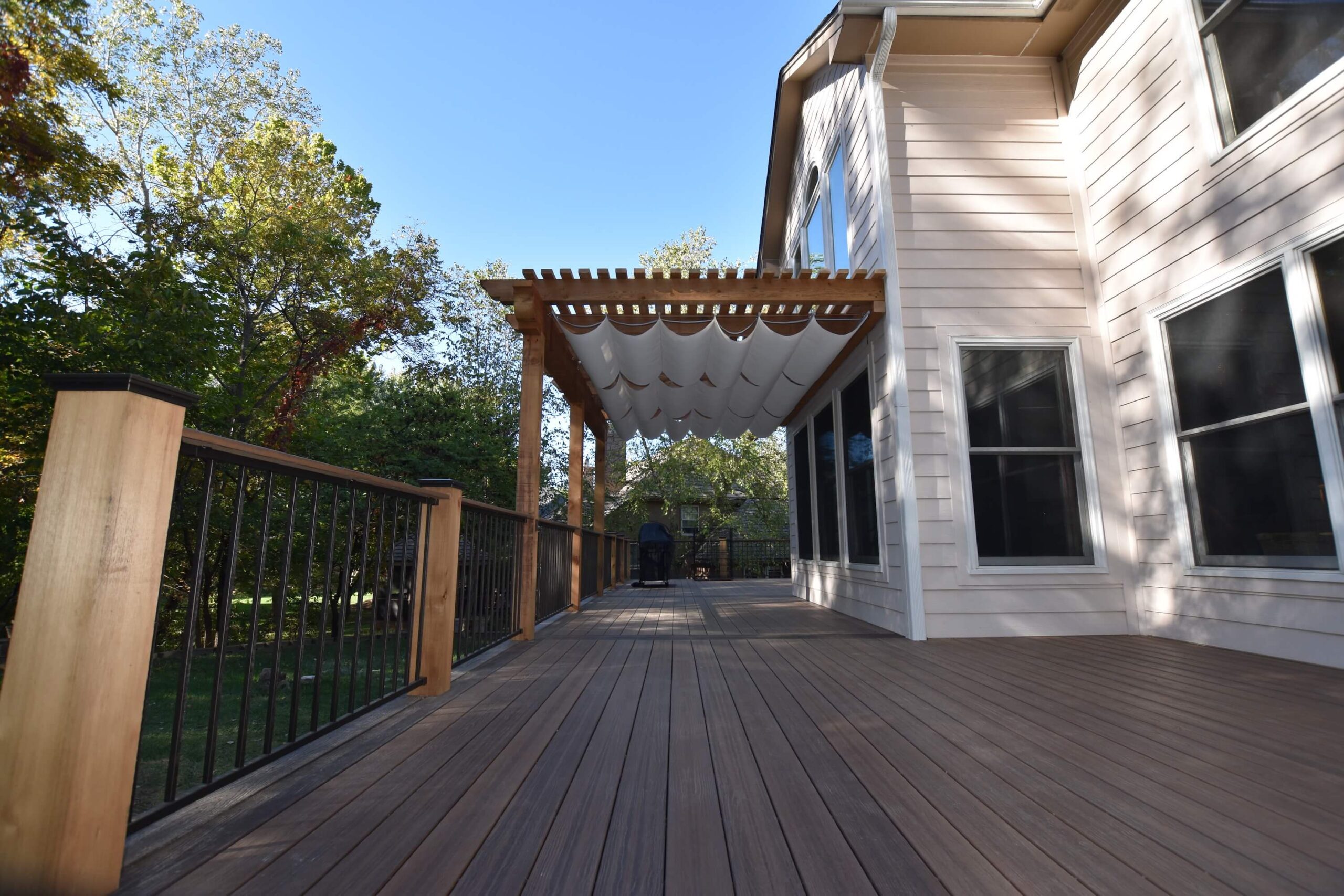 side view of pergola with white material underneath