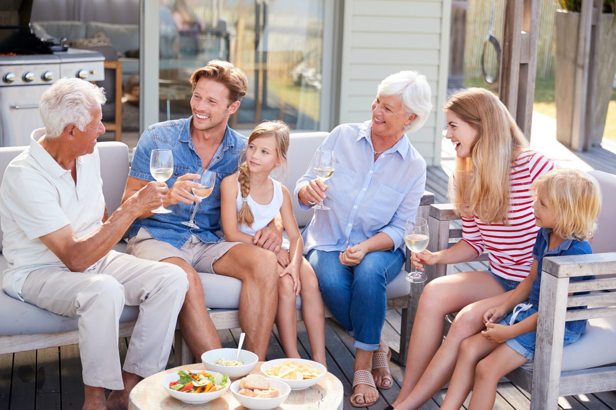 Family enjoying deck in spring