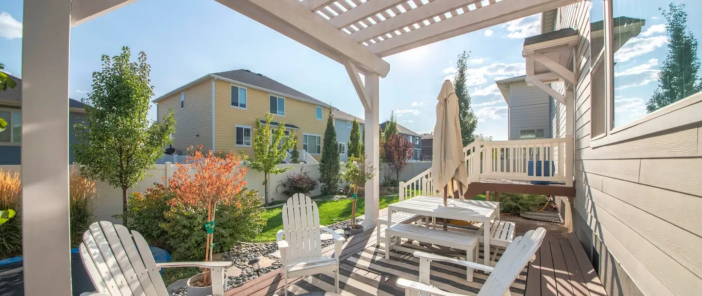 Custom deck and pergola with chairs